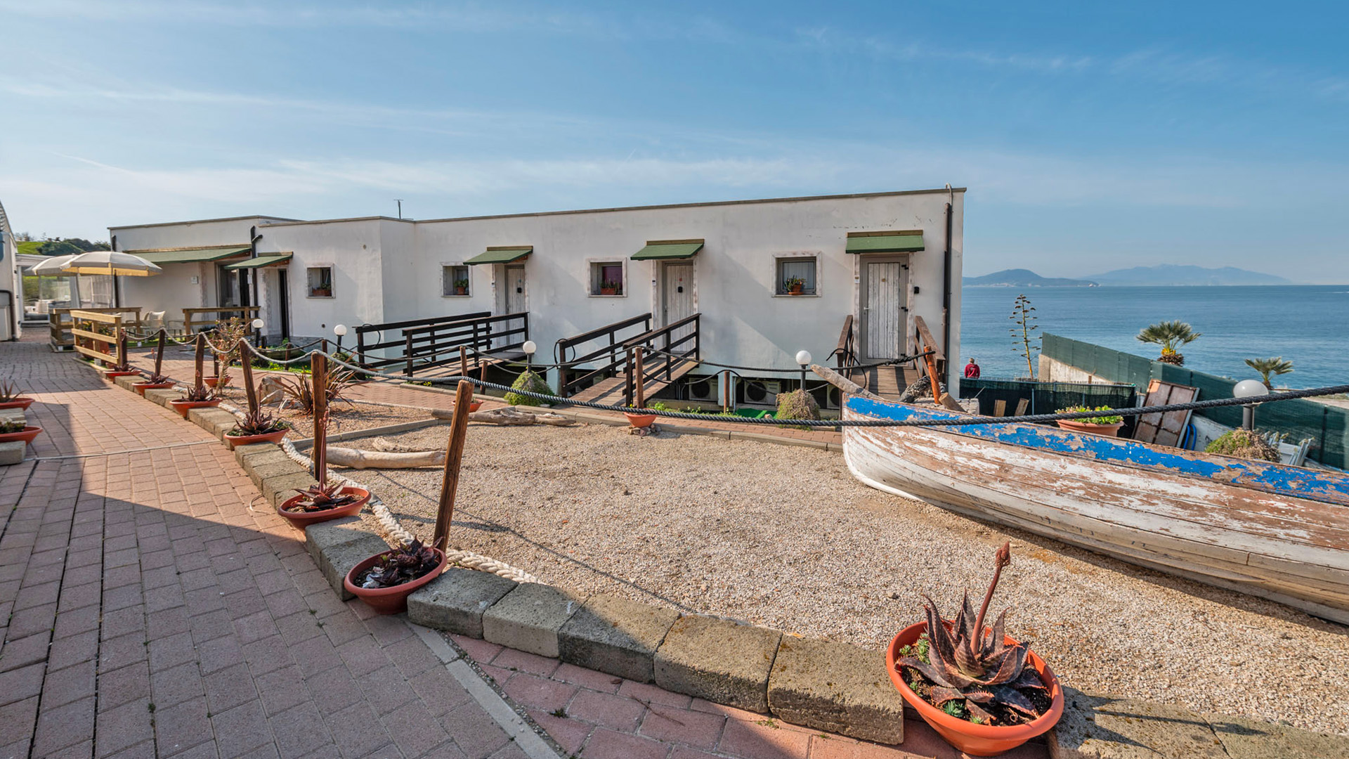 la rosa dei venti resort con BluNavy traghetti